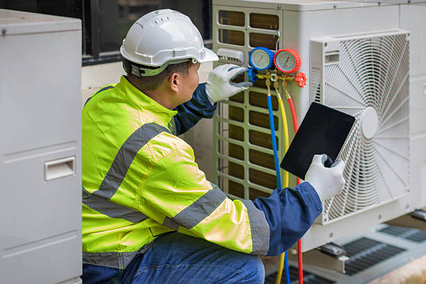 Professional Hvac technician working in Buzzards Bay, MA